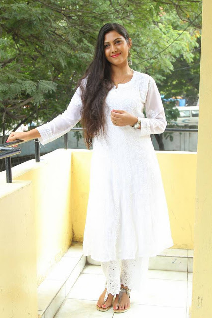 Television Actress Priyanka Naidu Long hair Stills In White Dress 9